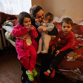 A mother and her children sitting on a bed. Links to Gifts That Protect Your Assets A mother and her children sitting on a bed. Links to Gifts That Protect Your Assets